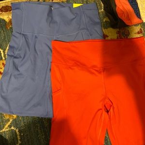 blue and red biker shorts with pockets